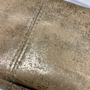 Trifold wallet that can be used as a wristlet.